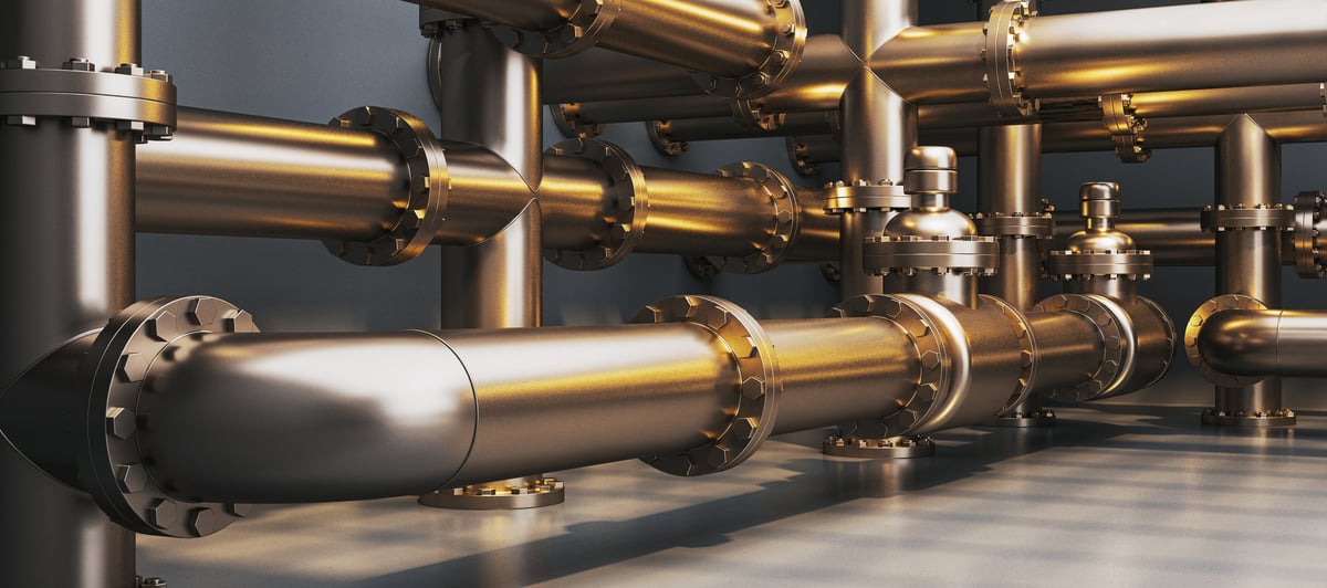 Metallic industrial pipeline system running through a plant